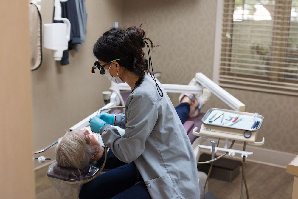 patient receiving dental bridge in augusta