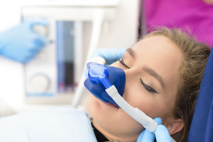 patient receiving nitrous oxide from sedation dentist in augusta