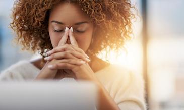 woman with a toothache needing an emergency dentist in augusta