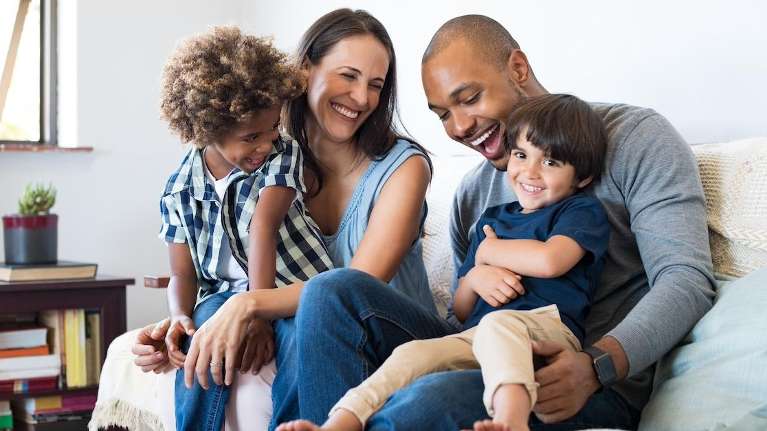 happy couple and their kids