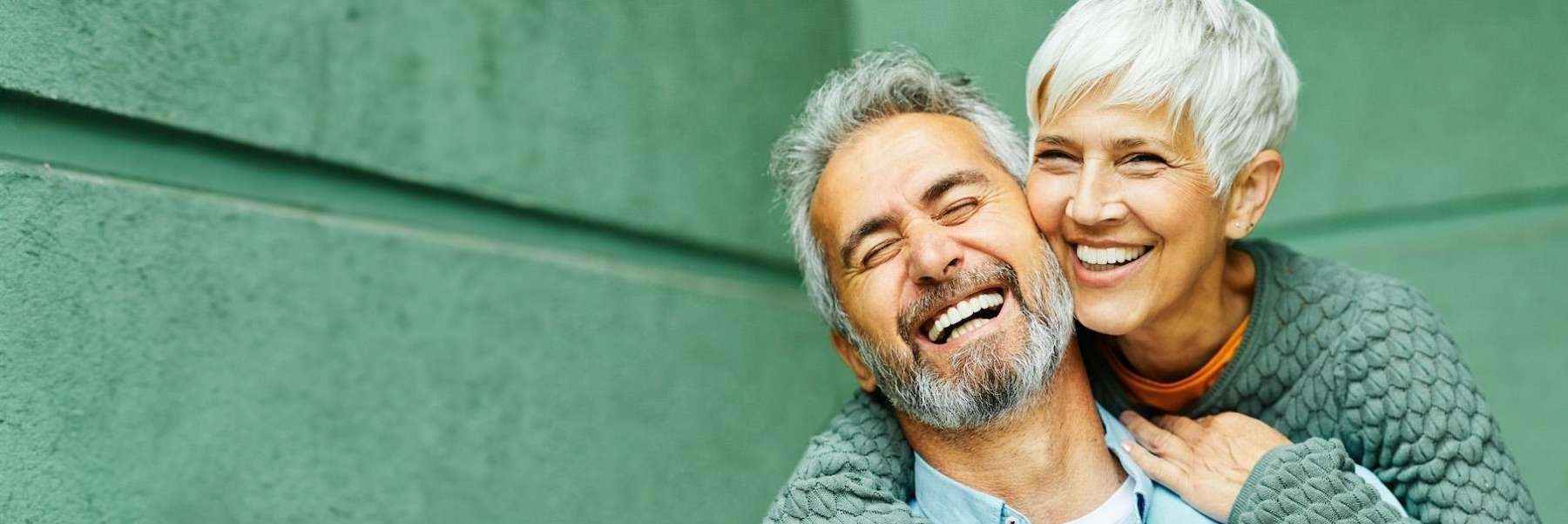 couple after getting dental implants in augusta, ga